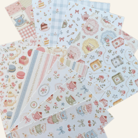 Tea Party printed scrapbook papers featuring teacups bows florals and vintage-inspired details